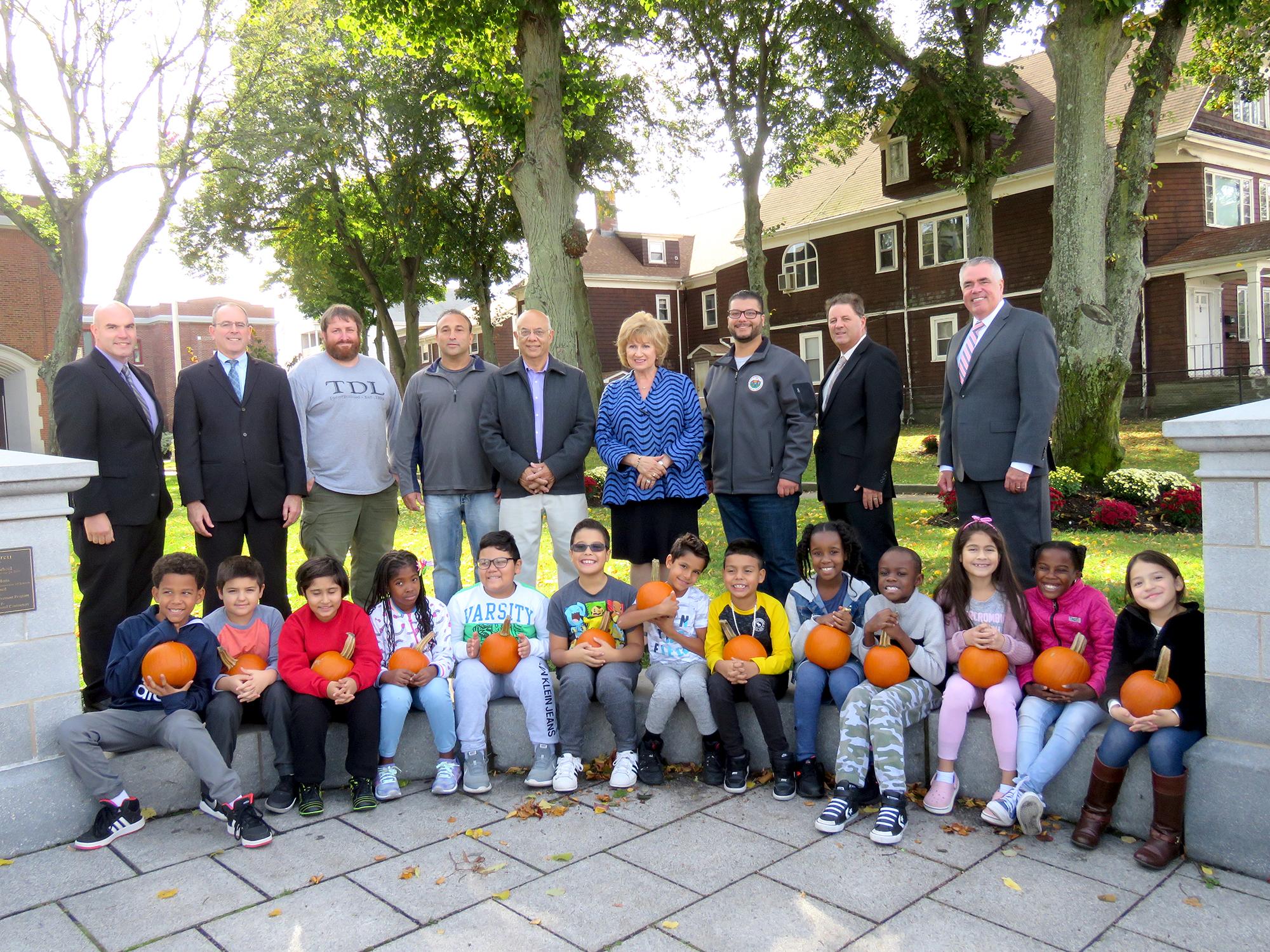 Parlin School students are pictured with Assistant Principal Dennis Lynch, Principal John Obremski, Trevor LaLiberte, Charlie Zammuto, Al Lattanzi, Superintendent Janice Gauthier, City Councilor Anthony DiPierro, and Assistant Superintendents Charles Obremski and Kevin Shaw.